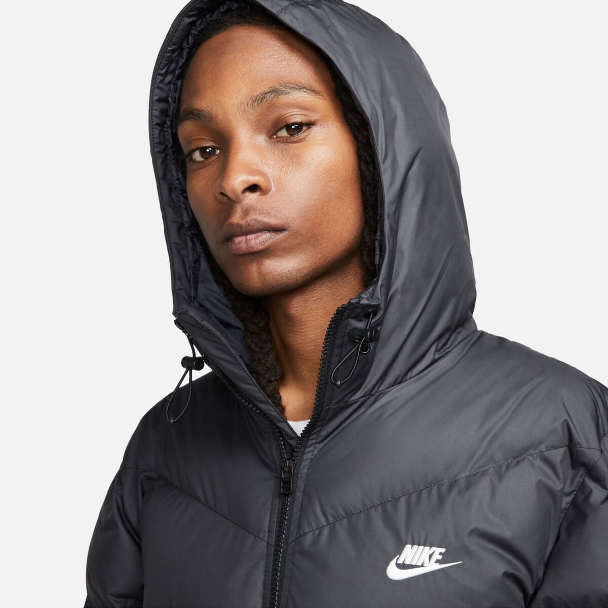 NIKE WINDRUNNER PRIMALOFT® STORM-FIT HOODED PARKA JACKET striukės