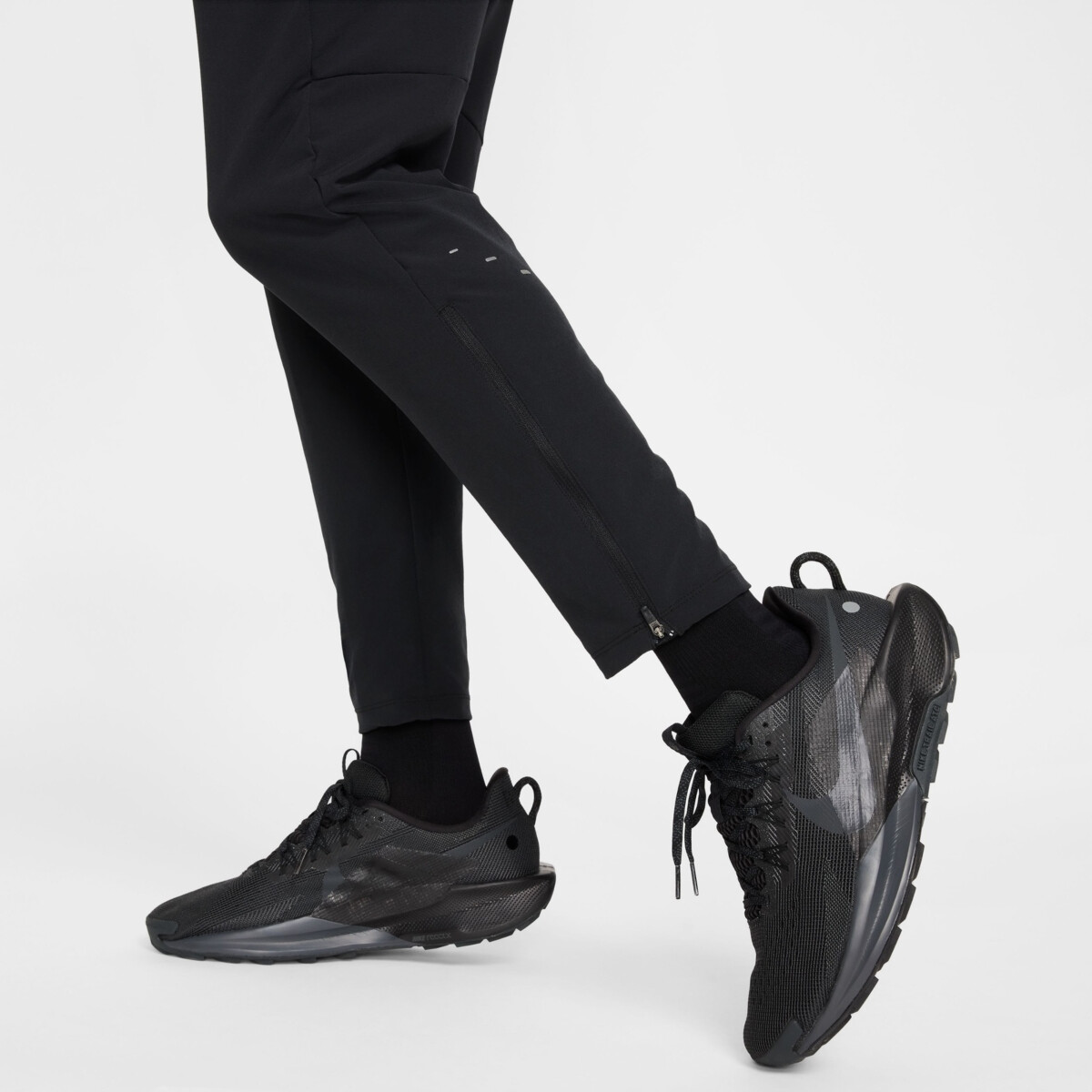 NIKE STRIDE DRI-FIT WOVEN RUNNING PANTS kelnės