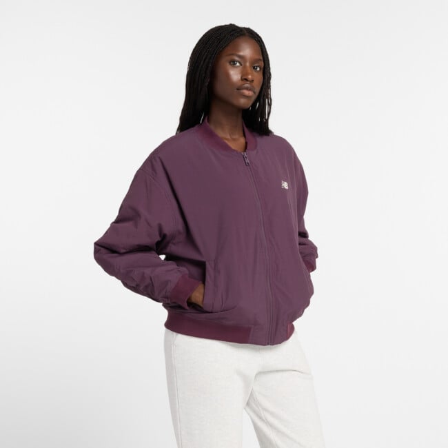 NEW BALANCE WOMEN'S GRAPHIC WOVEN BOMBER JACKET striukės ir